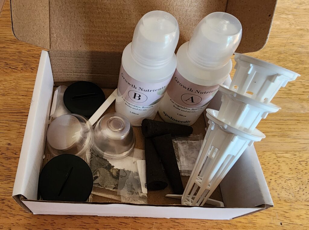 Countertop hydroponics kit with seeds sponges baskets domes and nutrient solution